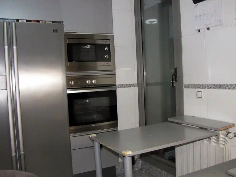 Wohnung zum Verkauf in Calle de Rafael Bergamín, 5, San Juan Bautista Küche von Wohnung zum Verkauf in Madrid Capital mit Klimaanlage und Schwimmbad