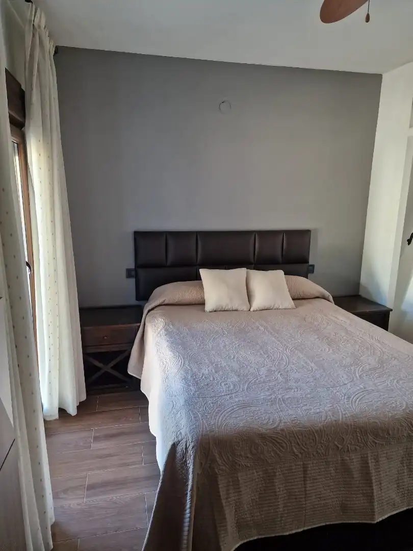 Einfamilien-Reihenhaus zur Miete in Calle Sierra Nevada, 9, Torremuelle Schlafzimmer von Einfamilien-Reihenhaus zur Miete in Benalmádena mit Heizung, Terrasse und Schwimmbad