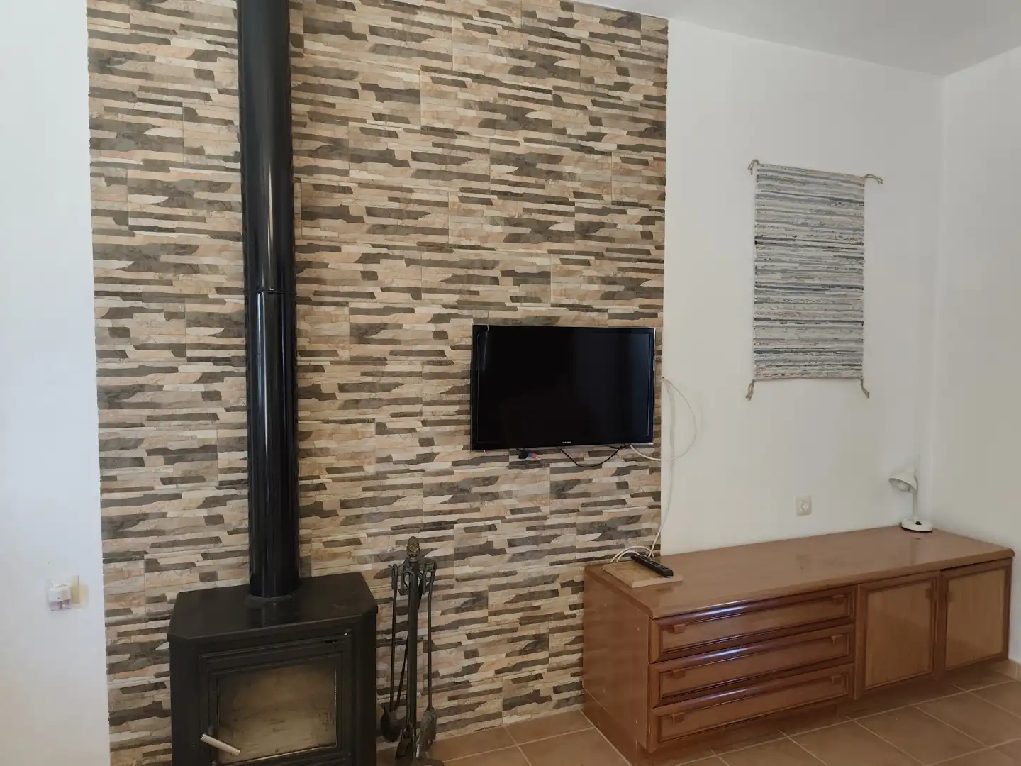 Sala de estar de Finca rústica de alquiler en Alpujarra de la Sierra con Calefacción, Jardín privado y Terraza