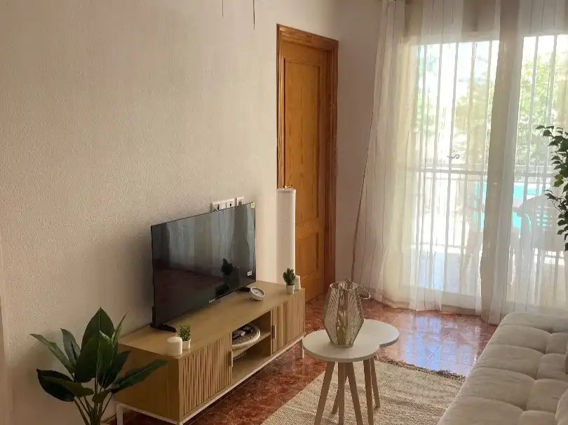 Apartament de lloguer a Passeig Marítim del Mediterrani, 48, Playa Morro de Gos Sala d'estar de Apartament de lloguer en Oropesa del Mar / Orpesa amb Terrassa, Piscina i Moblat