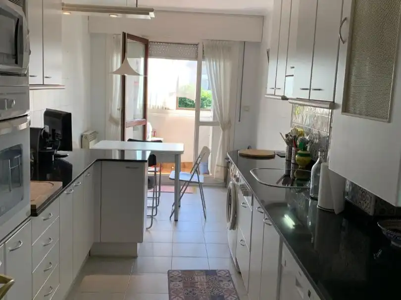 Piso en venta en Calle Concha Espina, 11, Valdenoja Cocina de Piso en venta en Santander con Terraza y Piscina