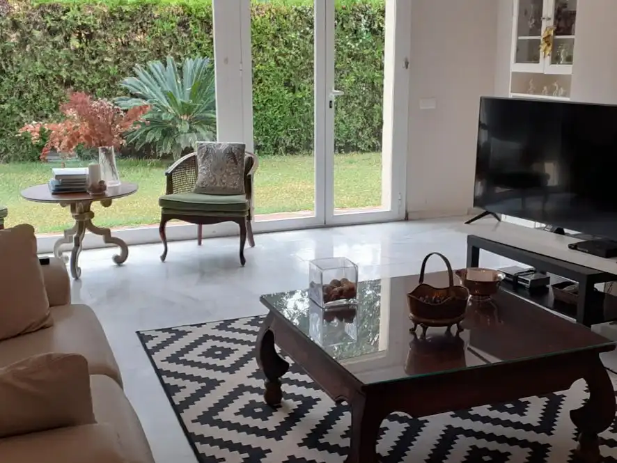 Sala de estar de Casa o chalet de alquiler en Gelves con Jardín privado, Terraza y Piscina