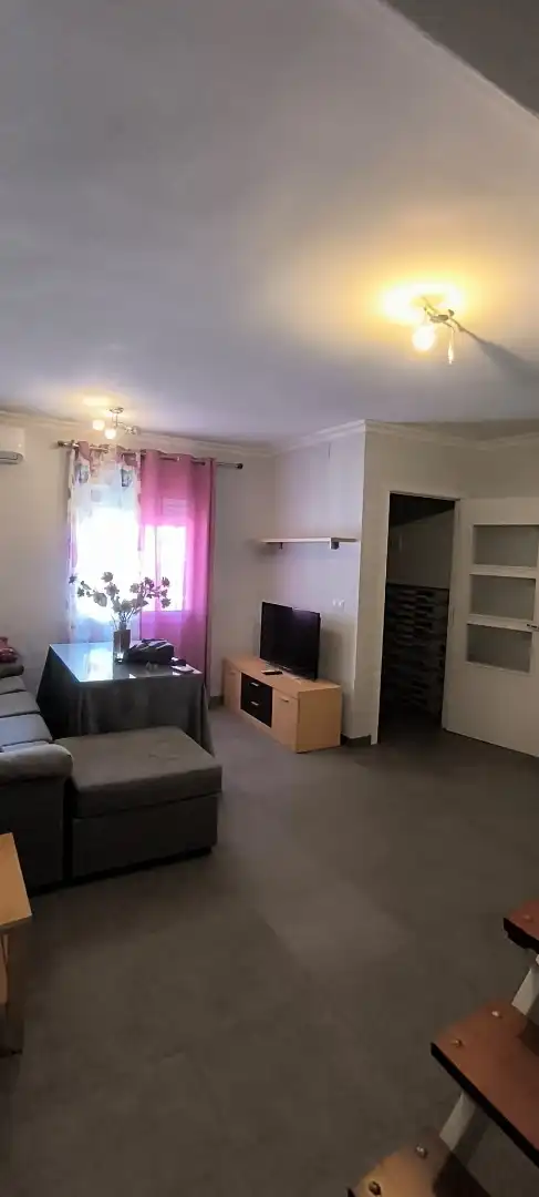 Sala de estar de Casa adosada de alquiler en Coria del Río con Aire acondicionado, Terraza y Trastero