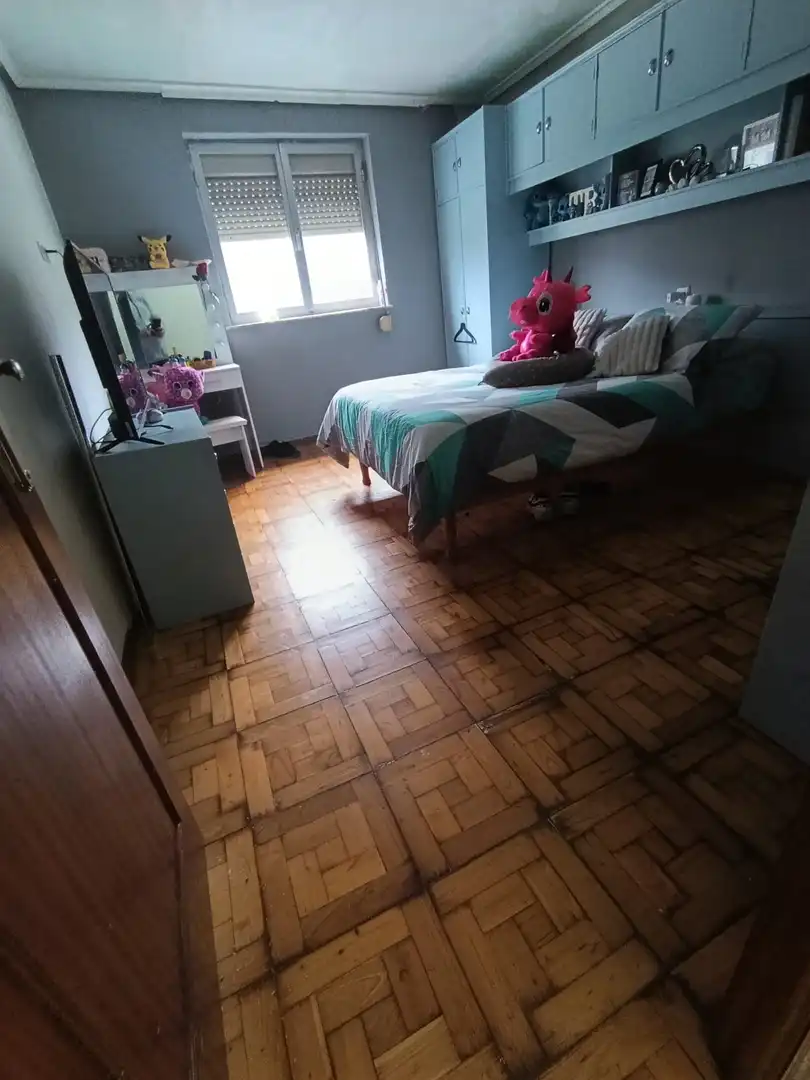 Habitación de Casa adosada en venta en Langreo