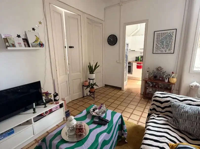 Habitación en Carrer de la Unió, 32, El Raval Sala de estar de Piso para compartir en Barcelona con Aire acondicionado, Calefacción y Amueblado