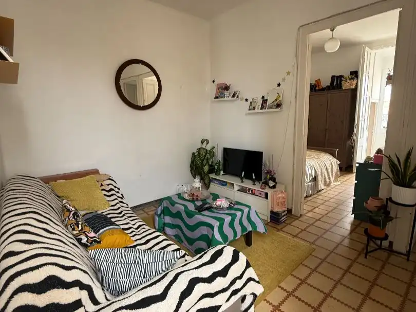 Habitación en Carrer de la Unió, 32, El Raval Sala de estar de Piso para compartir en Barcelona con Aire acondicionado, Calefacción y Amueblado