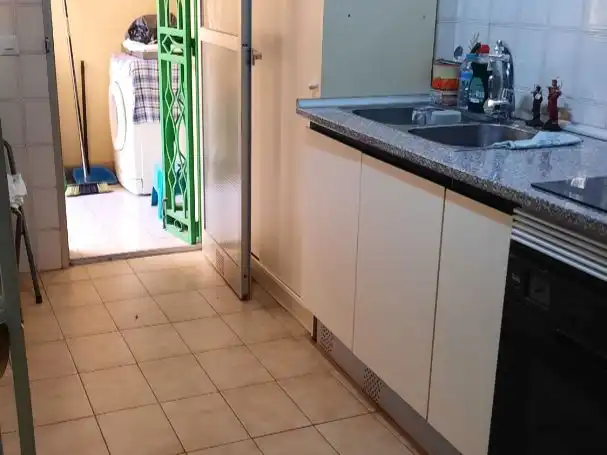 Pis en venda a Calle José Tallaví, 8, Barrio de Ciudad Jardín Cuina de Pis en venda en Málaga amb Calefacció, Jardí privat i Terrassa