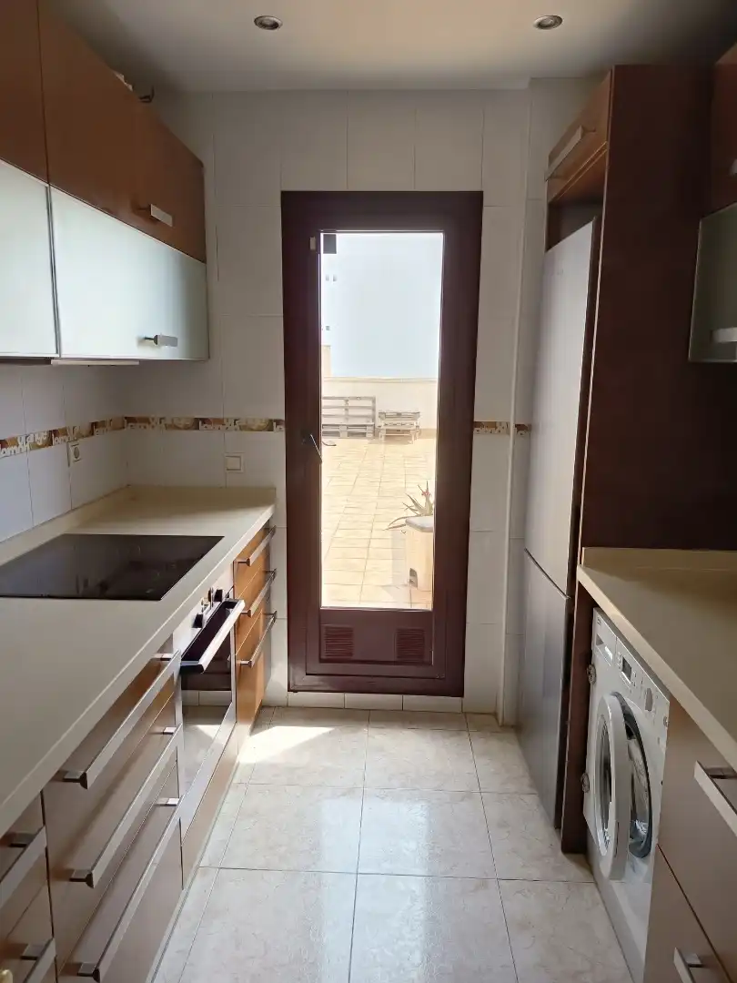 Kitchen of Attic for rent in Almería  with Air Conditioner, Terrace and Storage room