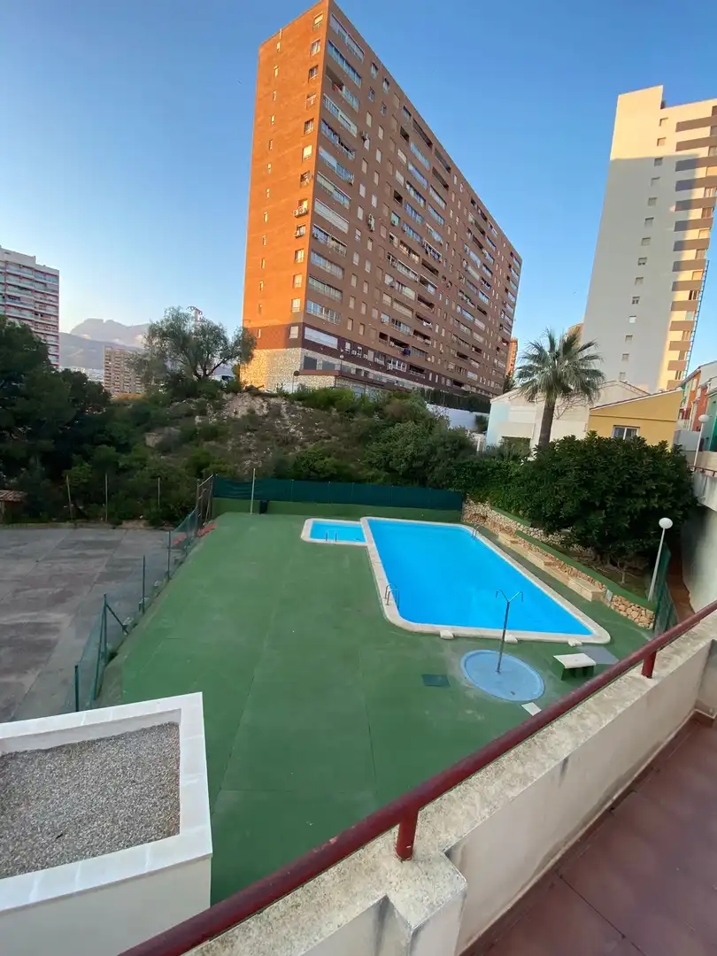 Piscina de Casa adosada en venta en Benidorm con Aire acondicionado, Jardín privado y Terraza