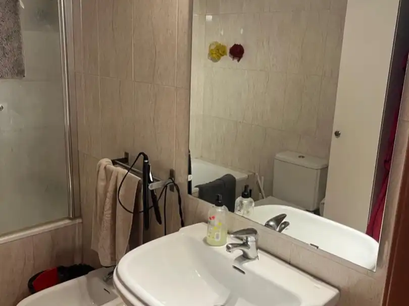 Wohnung zum Verkauf in Nulles Badezimmer von Wohnung zum Verkauf in Nulles mit Klimaanlage, Heizung und Privatgarten