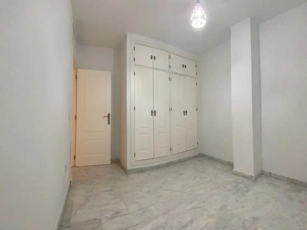 Wohnung zur Miete in San Luis, 93, San Gil Schlafzimmer von Wohnung zur Miete in Sevilla Capital mit Klimaanlage