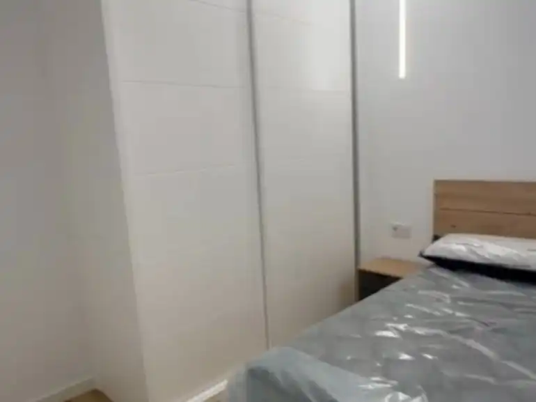 Habitación de Apartamento de alquiler en La Carlota con Aire acondicionado, Calefacción y Amueblado