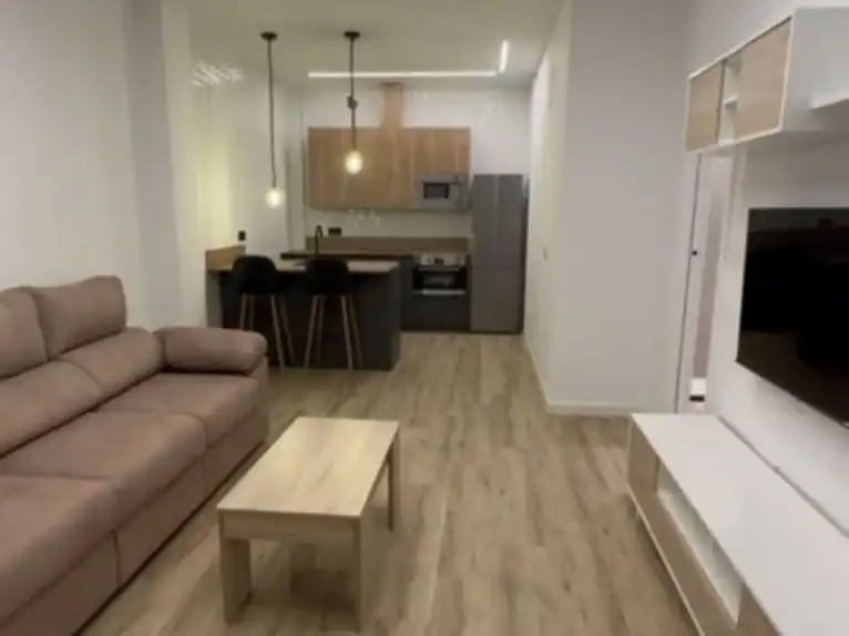 Sala de estar de Apartamento de alquiler en La Carlota con Aire acondicionado, Calefacción y Amueblado