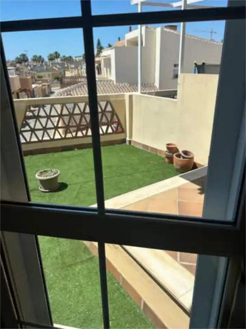Casa adosada de alquiler en El Tomillar Terraza de Casa adosada de alquiler en Vélez-Málaga con Calefacción, Jardín privado y Terraza