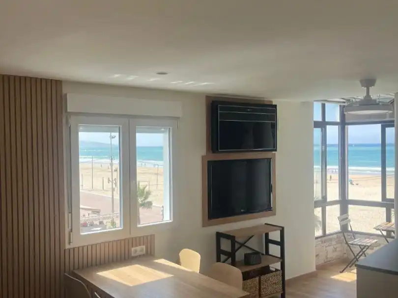 Pis de lloguer a Avenida Atlántico, 32, Barbate ciudad Sala d'estar de Pis de lloguer en Barbate amb Aire condicionat, Terrassa i Moblat