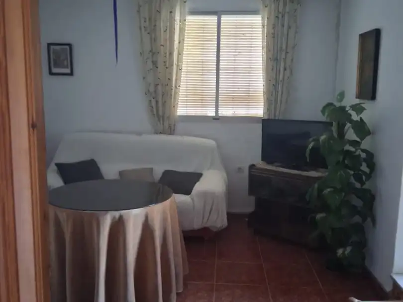 Sala de estar de Piso en venta en Salobreña con Jardín privado, Trastero y Balcón