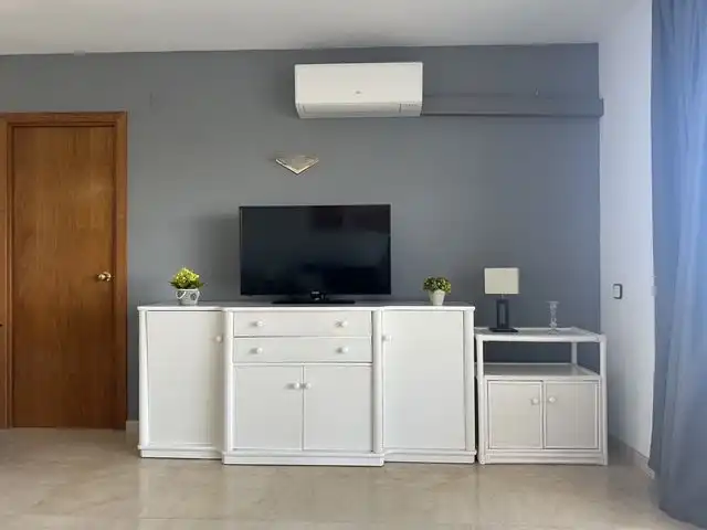 Wohnung zum Verkauf in Carrer de Terol, 2, Mar i Camp - Platja dels Capellans Wohnzimmer von Wohnung zum Verkauf in Salou mit Klimaanlage, Terrasse und Schwimmbad