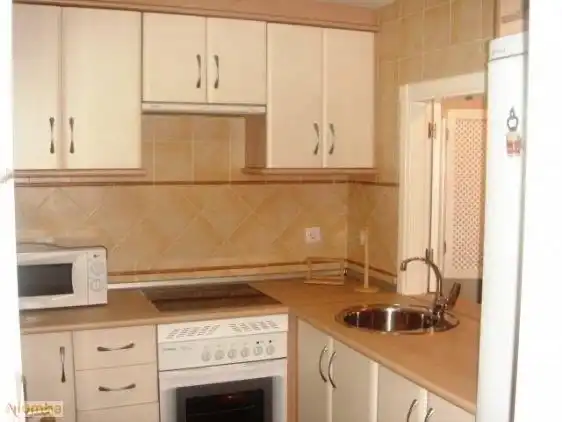 Kitchen of Flat for rent in Ayamonte  with Air Conditioner, Heating and Private garden