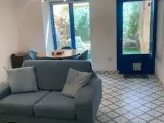 Casa adosada en venta en Carrer de Sant Roc, 58, Càlig Sala de estar de Casa adosada en venta en Càlig con Aire acondicionado, Calefacción y Jardín privado