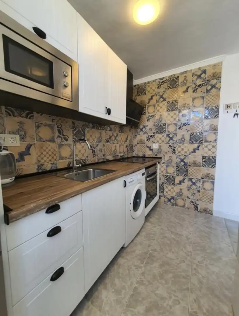 Einfamilien-Reihenhaus zur Miete in Calle Aldea, 1, Chullera Küche von Einfamilien-Reihenhaus zur Miete in Manilva mit Klimaanlage, Privatgarten und Terrasse