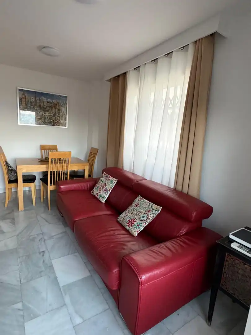 Einfamilien-Reihenhaus zur Miete in Calle Aldea, 1, Chullera Wohnzimmer von Einfamilien-Reihenhaus zur Miete in Manilva mit Klimaanlage, Privatgarten und Terrasse