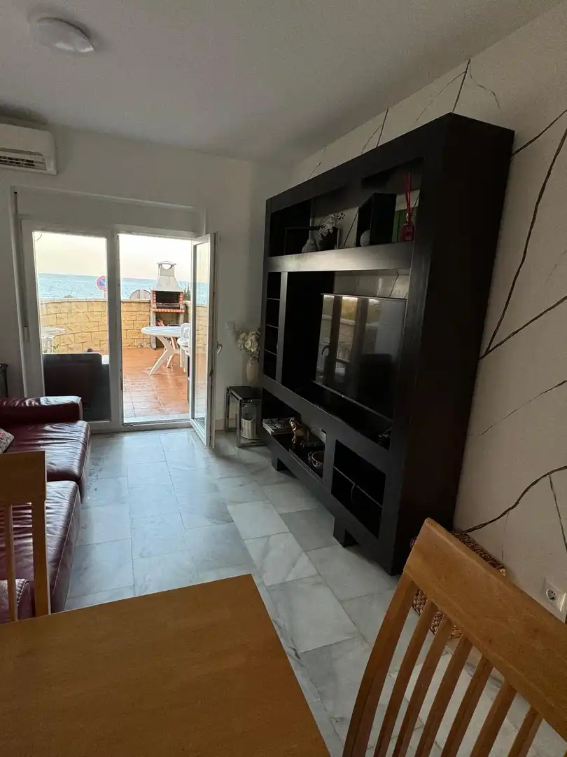Einfamilien-Reihenhaus zur Miete in Calle Aldea, 1, Chullera Wohnzimmer von Einfamilien-Reihenhaus zur Miete in Manilva mit Klimaanlage, Privatgarten und Terrasse