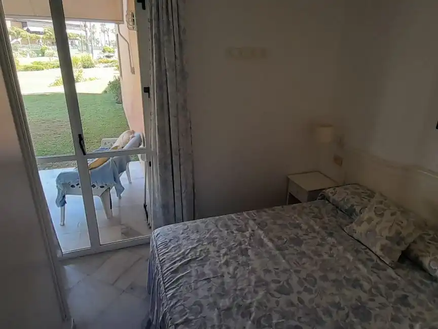 Apartament de lloguer a Avenida de Islantilla, 1, Islantilla Costa Dormitori de Apartament de lloguer en Islantilla amb Calefacció, Jardí privat i Terrassa