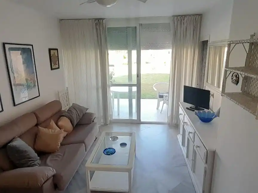 Apartament de lloguer a Avenida de Islantilla, 1, Islantilla Costa Sala d'estar de Apartament de lloguer en Islantilla amb Calefacció, Jardí privat i Terrassa