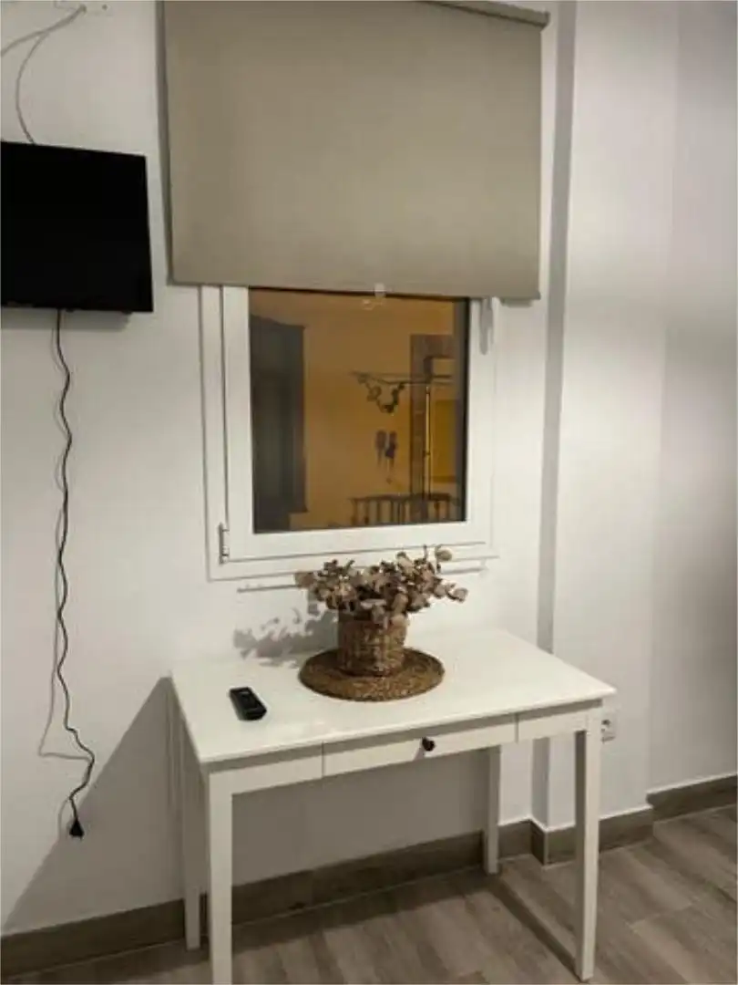 Habitació a Barriada España - San Pedro Dormitori de Apartament per a compartir en Jerez de la Frontera amb Jardí privat, Terrassa i Moblat