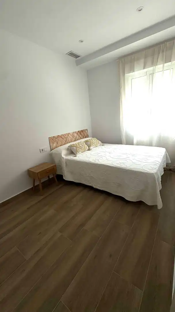 Casa adosada de lloguer a Calle Urbano Arregui, 78, Playa de los Náufragos Dormitori de Casa adosada de lloguer en Torrevieja amb Aire condicionat, Terrassa i Moblat