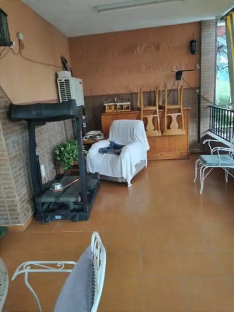 Sala d'estar de Casa adosada en venda en Alberic amb Calefacció, Jardí privat i Terrassa