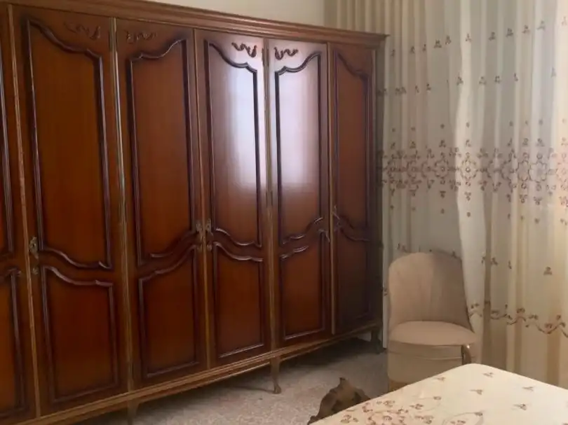 Casa adosada en venda a Calle Virgen de las Virtudes, 8, La Puebla de Cazalla Dormitori de Casa adosada en venda en La Puebla de Cazalla amb Aire condicionat i Terrassa