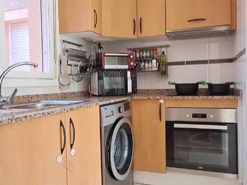 Flat for rent in Carrer de Creta, 80, Monte y Mar Kitchen of Flat for rent in Santa Pola with Air Conditioner, Private garden and Terrace