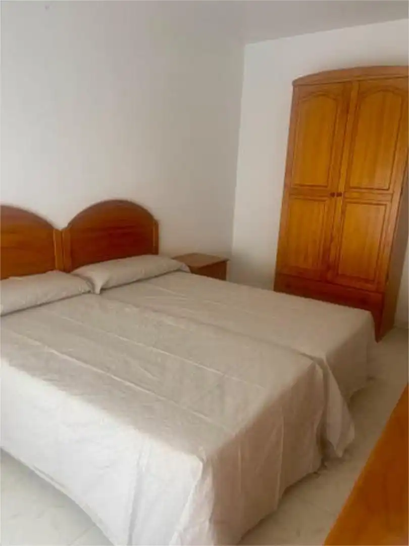 Dormitori de Apartament de lloguer en El Ejido amb Moblat