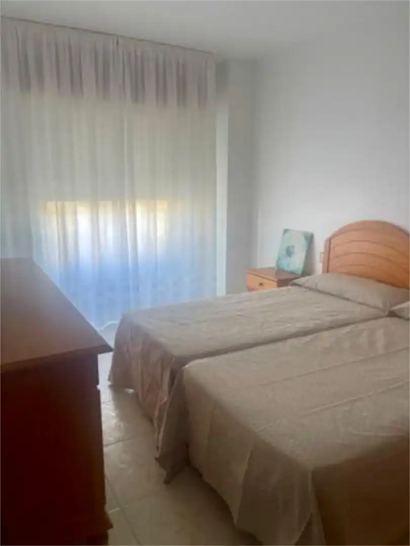 Dormitori de Apartament de lloguer en El Ejido amb Moblat