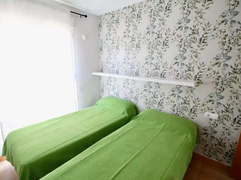 Wohnung zur Miete in Carretera de les Marines a Dénia, El Palmar - Los Molinos Schlafzimmer von Wohnung zur Miete in Dénia mit Klimaanlage, Heizung und Privatgarten