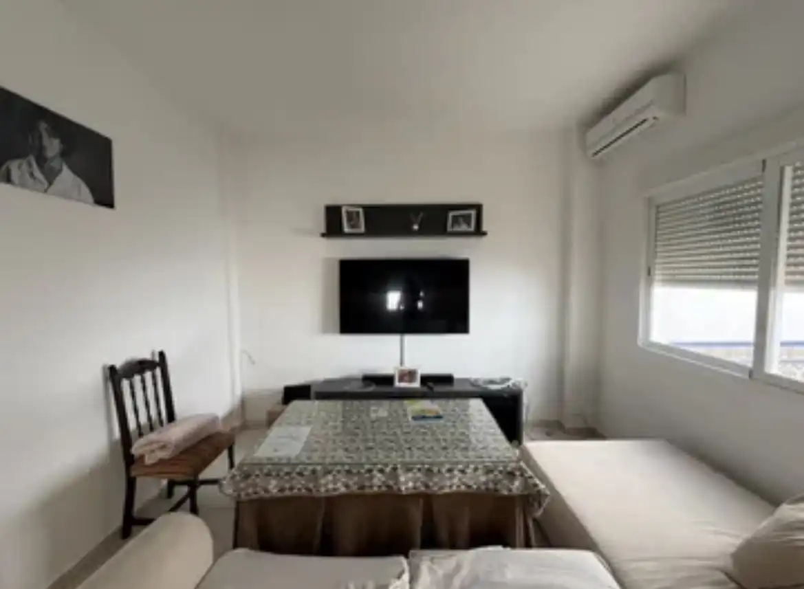 Casa adosada en venta en Calle Nueva, 56, Aznalcázar Sala de estar de Casa adosada en venta en Aznalcázar con Aire acondicionado, Parquet y Piscina