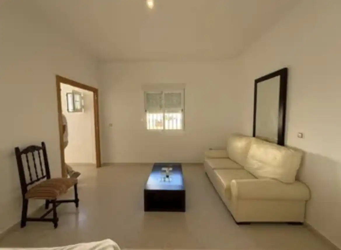 Casa adosada en venta en Calle Nueva, 56, Aznalcázar Sala de estar de Casa adosada en venta en Aznalcázar con Aire acondicionado, Parquet y Piscina