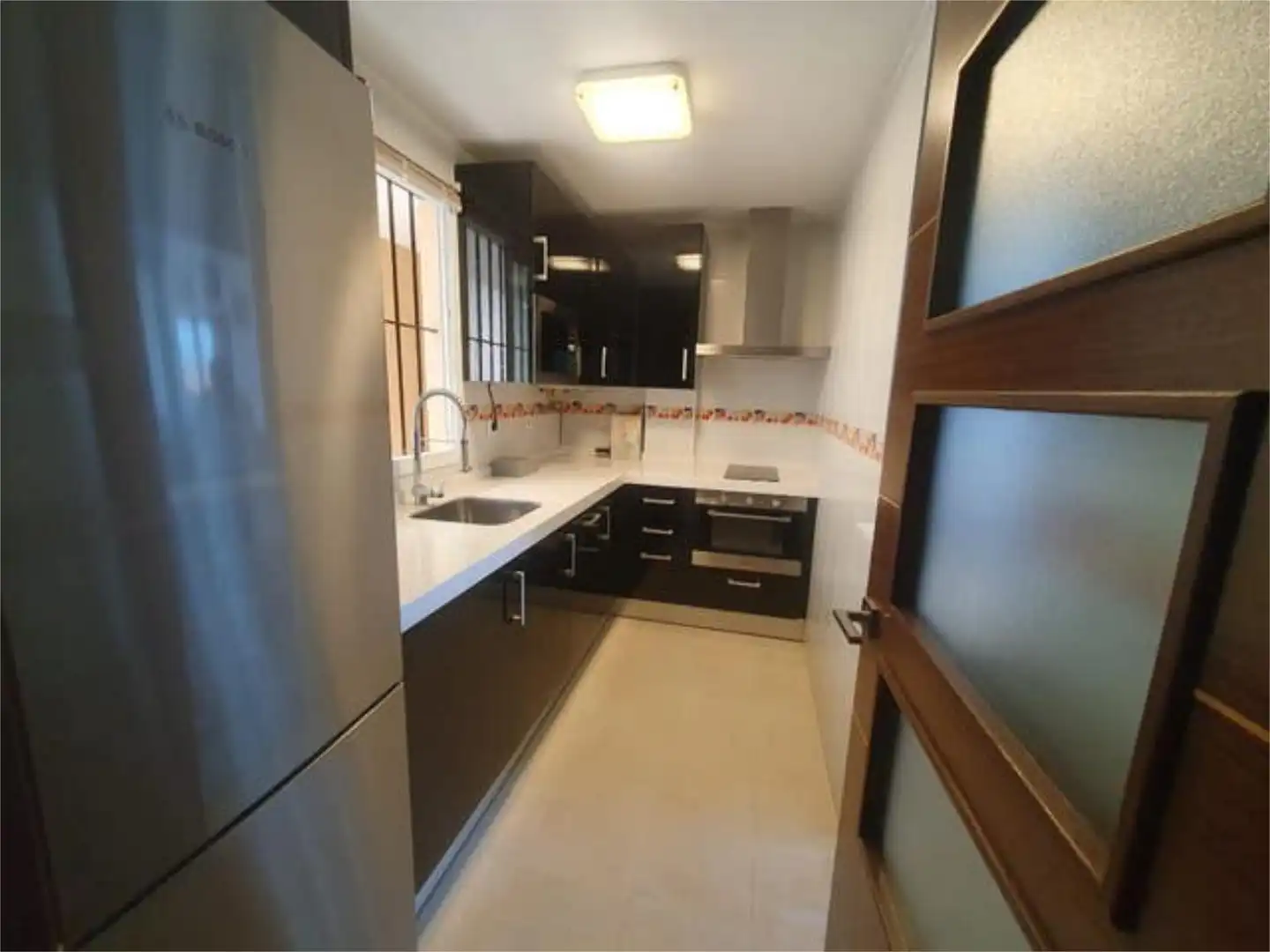 Piso de alquiler en Bonanza - Avda de Huelva - Barrio Andalucia Cocina de Piso de alquiler en Sanlúcar de Barrameda