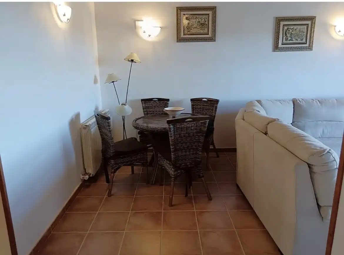 Dúplex en venta en ኡርባኒሳሲኦን ካምፖ ዴ ጎልፍ ባዳጓስ, 77a, Poblaciones norte Comedor de Dúplex en venta en Jaca con Aire acondicionado, Terraza y Piscina