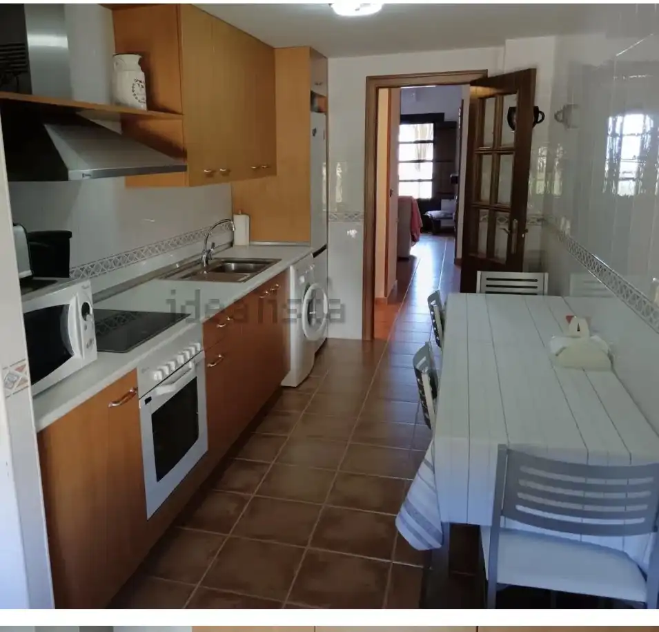Dúplex en venta en ኡርባኒሳሲኦን ካምፖ ዴ ጎልፍ ባዳጓስ, 77a, Poblaciones norte Cocina de Dúplex en venta en Jaca con Aire acondicionado, Terraza y Piscina