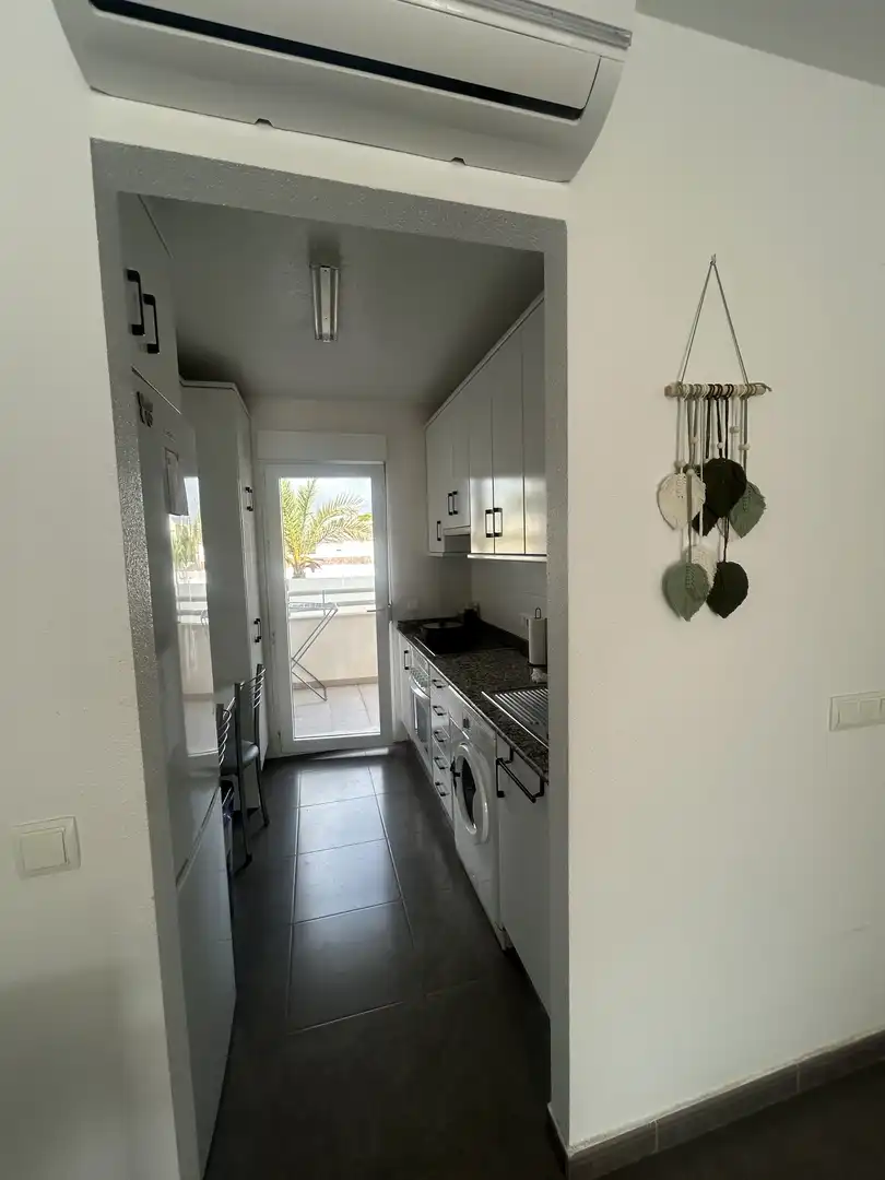 Planta baja de alquiler en Calle Ferrara, Entremares Cocina de Planta baja de alquiler en La Manga del Mar Menor con Aire acondicionado, Calefacción y Terraza