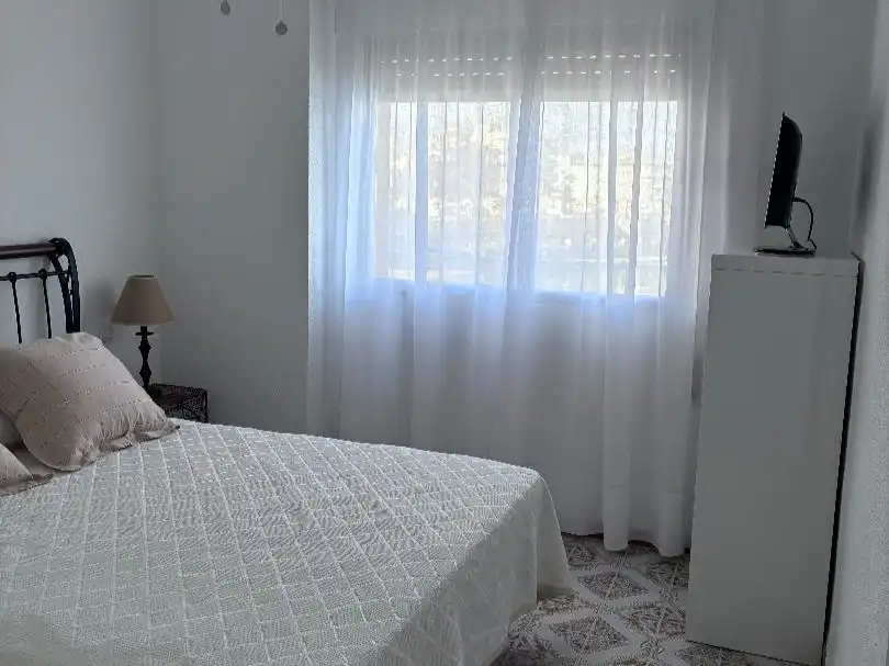 Wohnung zur Miete in Strasse el Barón Km7, ., Playa de las Gaviotas - El Pedrucho Schlafzimmer von Wohnung zur Miete in La Manga del Mar Menor mit Klimaanlage und Terrasse