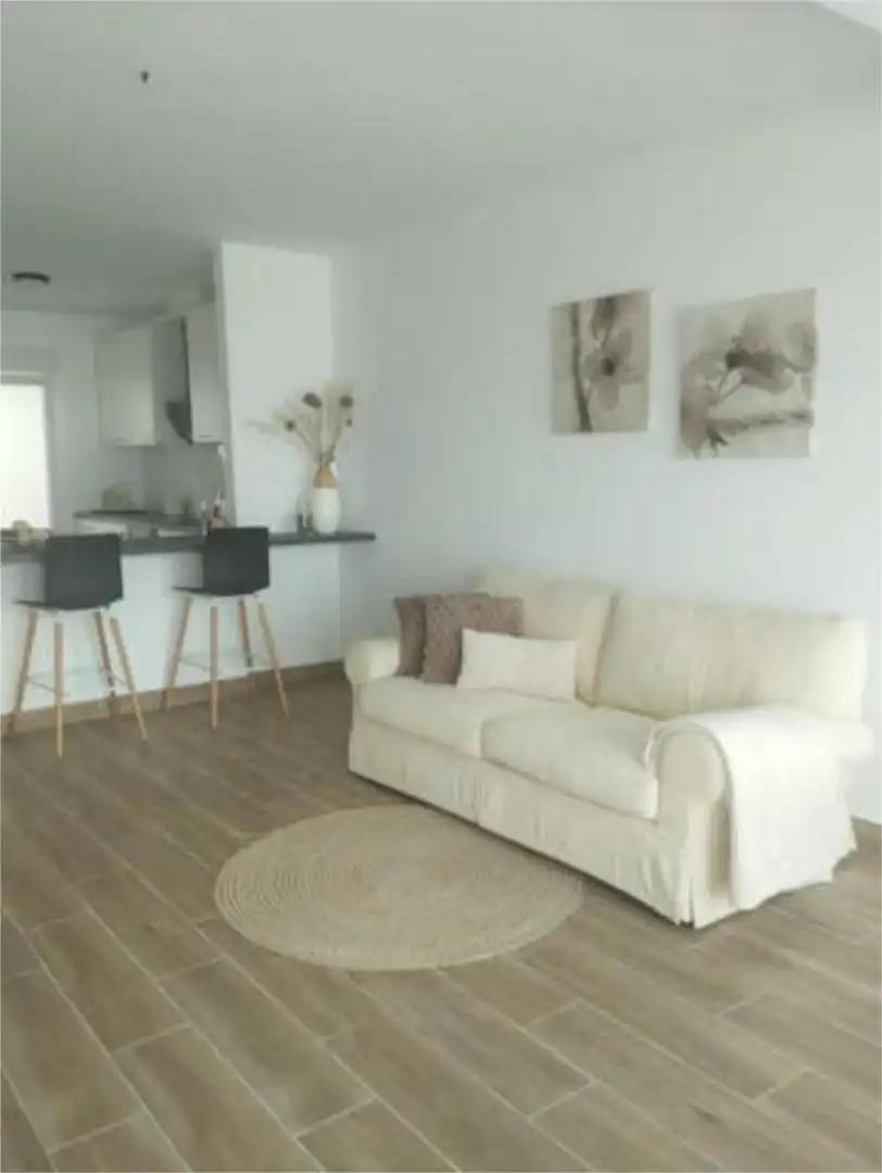 Sala de estar de Casa adosada en venta en Rojales con Terraza