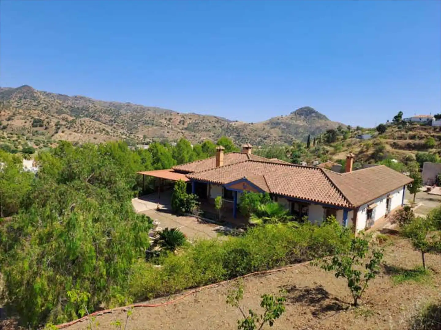 Casa adosada en venta en Almogía Vista exterior de Casa adosada en venta en Almogía con Jardín privado, Piscina y Amueblado