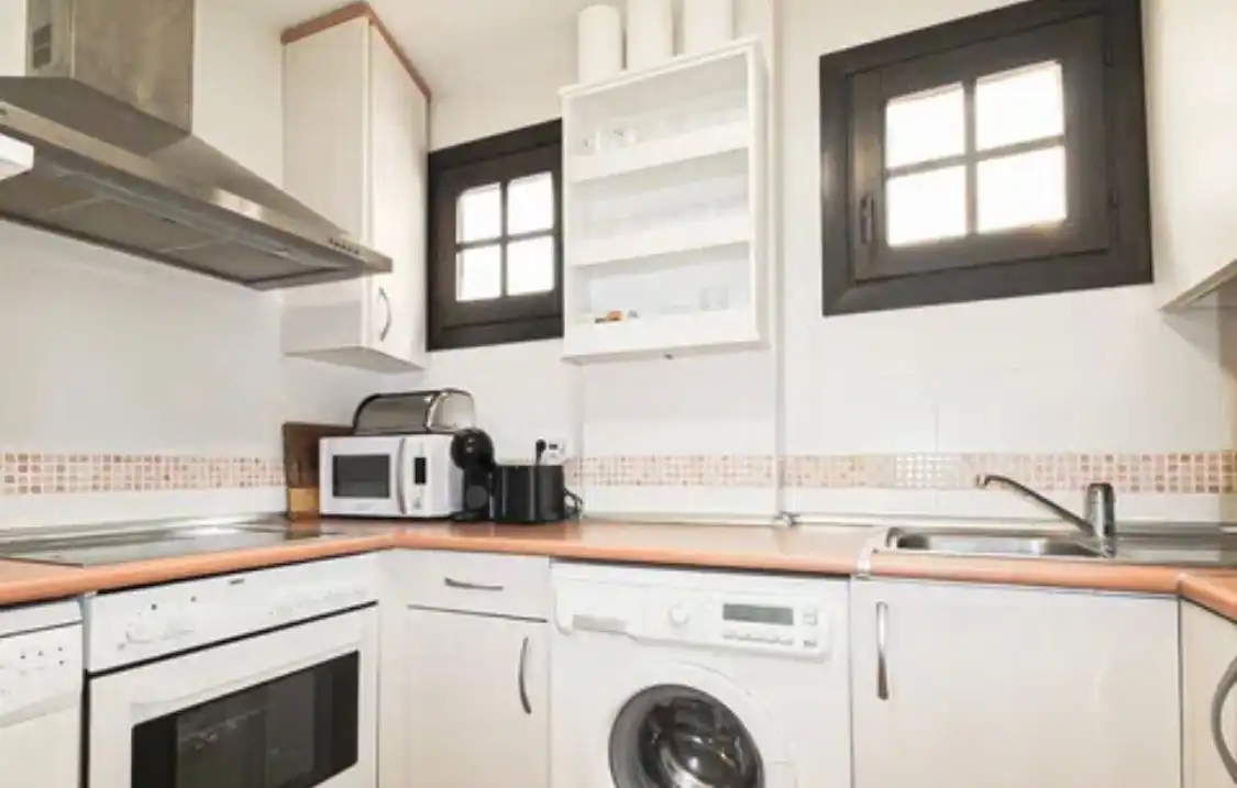Piso de alquiler en Calle San Francisco, Vélez de Benaudalla Cocina de Piso de alquiler en Vélez de Benaudalla con Aire acondicionado, Jardín privado y Terraza