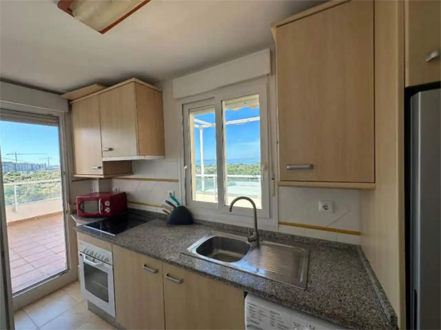 Flat for rent in Almerimar Kitchen of Flat for rent in El Ejido with Private garden, Terrace and Swimming Pool