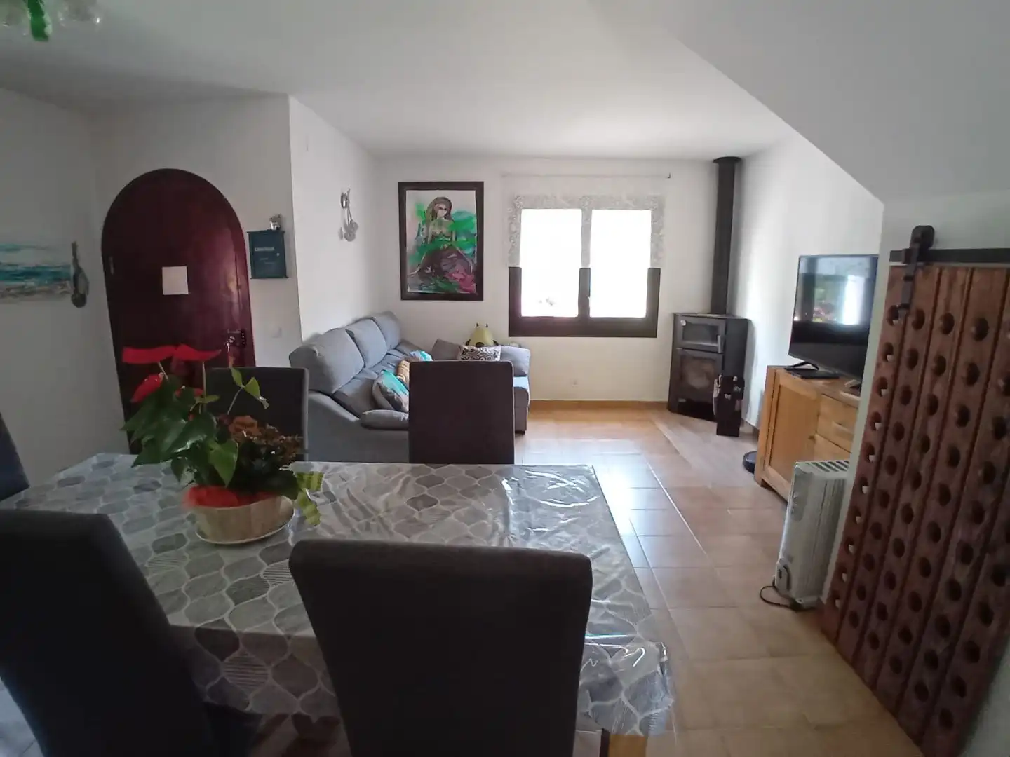 Casa adosada en venda a Carrer Priorat, 18, Calafell Residencial Sala d'estar de Casa adosada en venda en Calafell amb Jardí privat, Terrassa i Traster