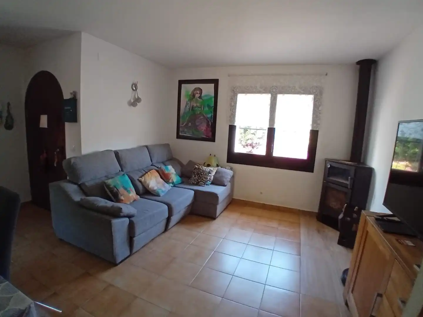 Casa adosada en venda a Carrer Priorat, 18, Calafell Residencial Sala d'estar de Casa adosada en venda en Calafell amb Jardí privat, Terrassa i Traster