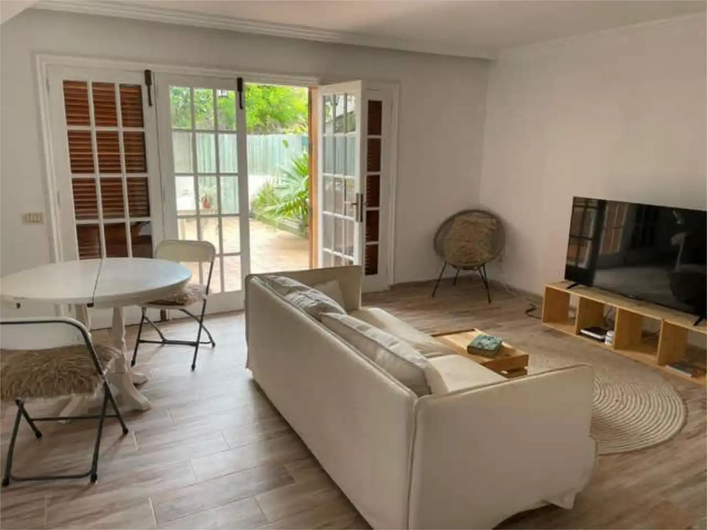 Sala d'estar de Casa adosada de lloguer en Puerto de la Cruz amb Jardí privat, Terrassa i Piscina